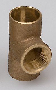 A red brass tee plumbing fitting